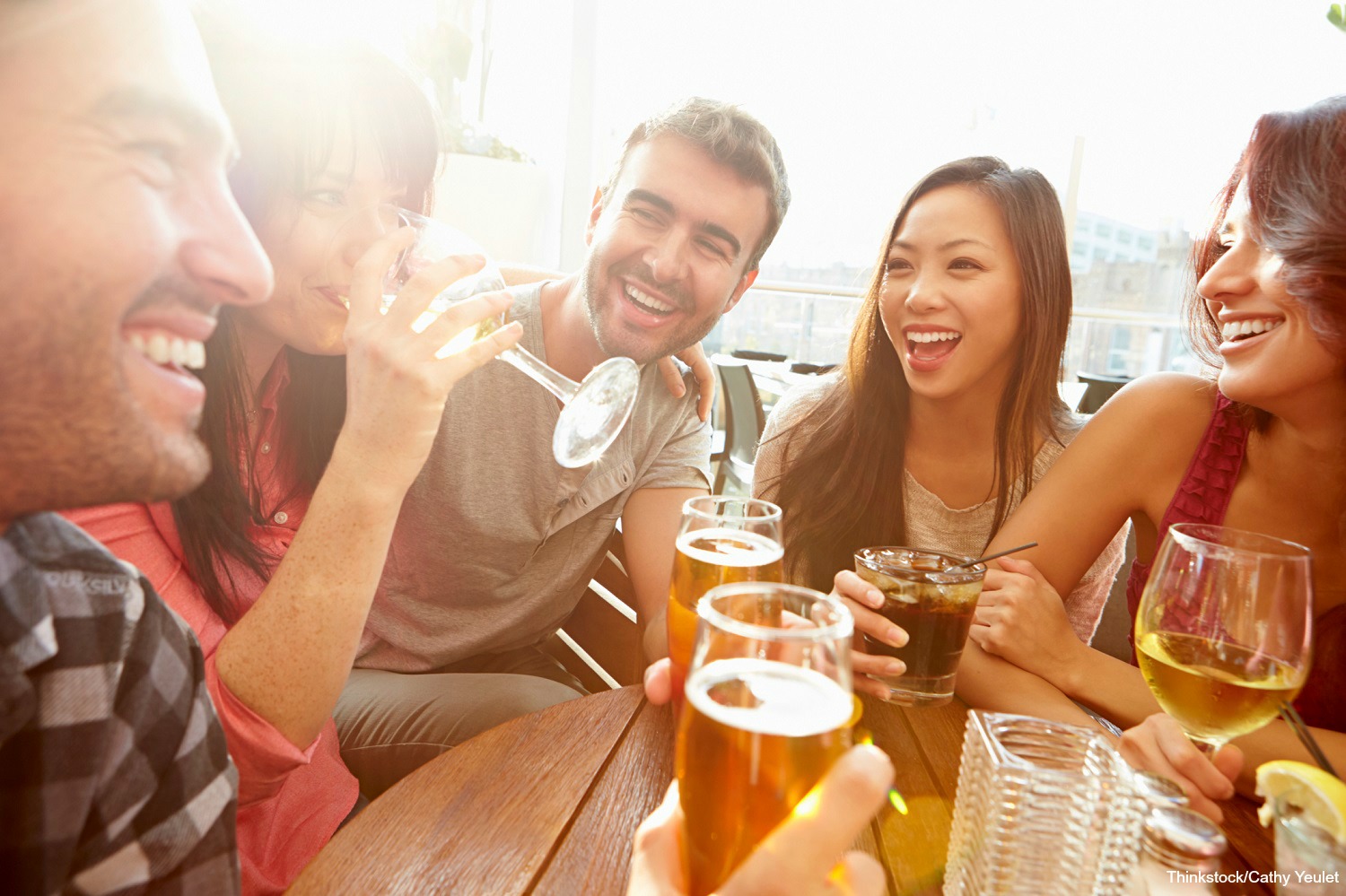 Group of friends drinking outdoors